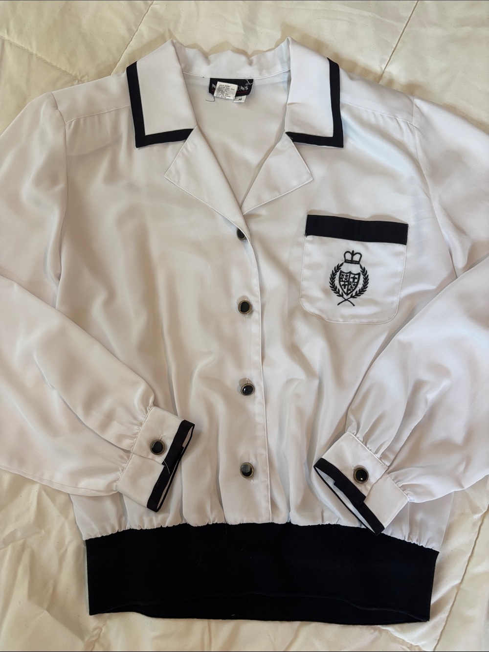 Notations White Blouse with Black Trim and Crest